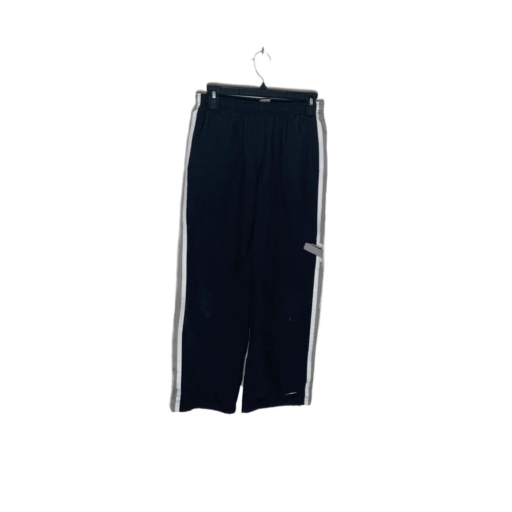 NIKE black athletic sweatpants. Side pockets. Zipper opening. Elastic waist. SZL